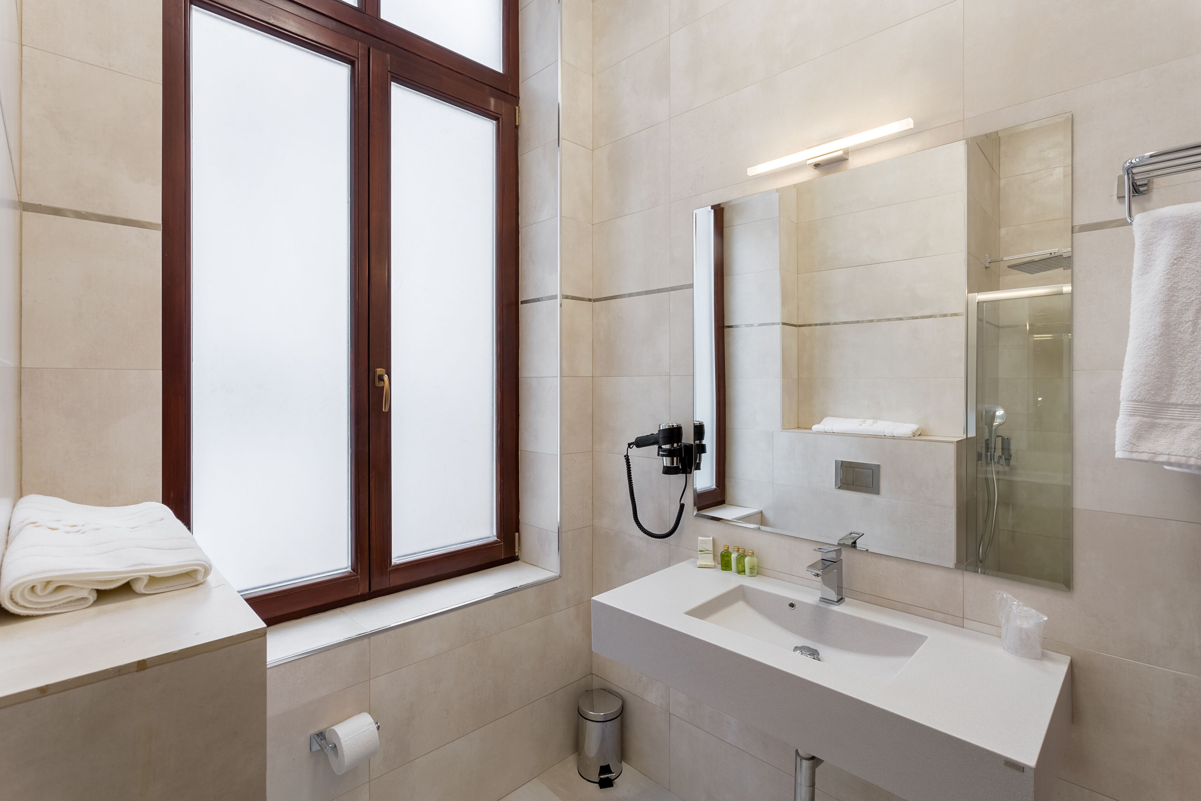 shower, hair dryer, bathrobes, slippers