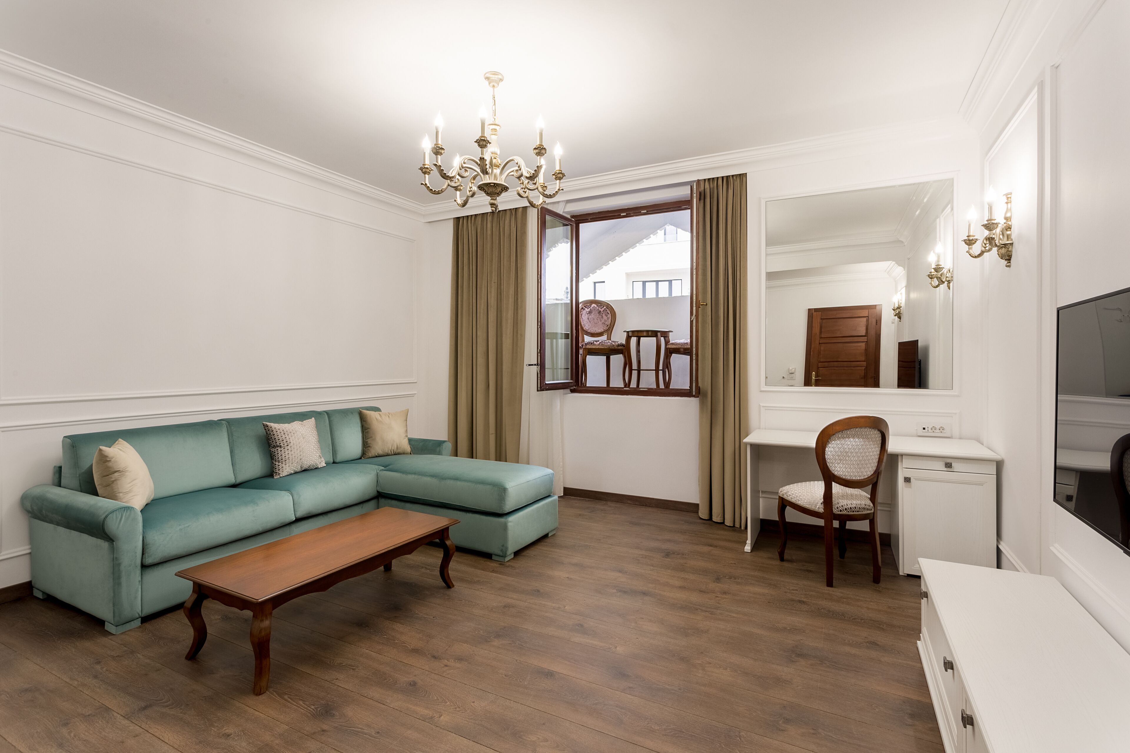 deluxe apartment, 1 bedroom | living room | 55-inch led tv with satellite channels, tv, heated floors