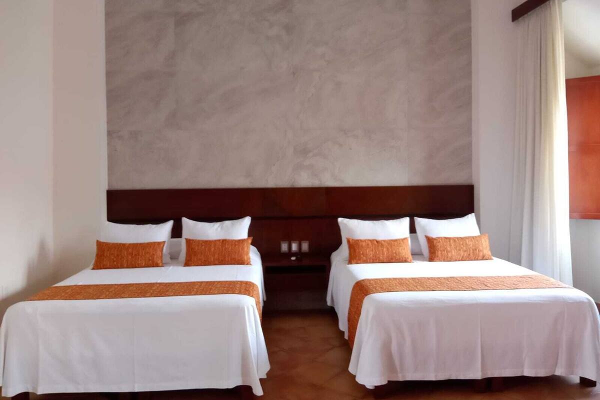 Deluxe Double Room, 2 Queen Beds, Balcony, City View | 1 bedroom, minibar, in-room safe, individually furnished