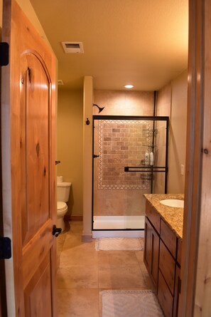 Bathtub, towels, soap, shampoo