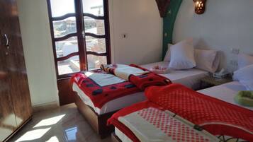 2 bedrooms, individually decorated, bed sheets