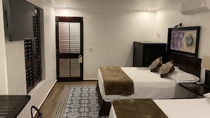 Deluxe Room, 2 Double Beds | Iron/ironing board, WiFi (free), bed sheets - Hotel Raíces de Mar (Mazatlán)
