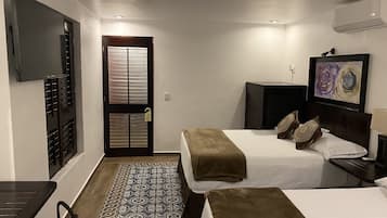 Deluxe Room, 2 Double Beds | Iron/ironing board, free WiFi, bed sheets