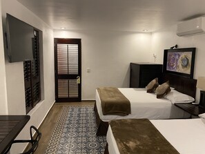 Deluxe Room, 2 Double Beds | Iron/ironing board, free WiFi, bed sheets