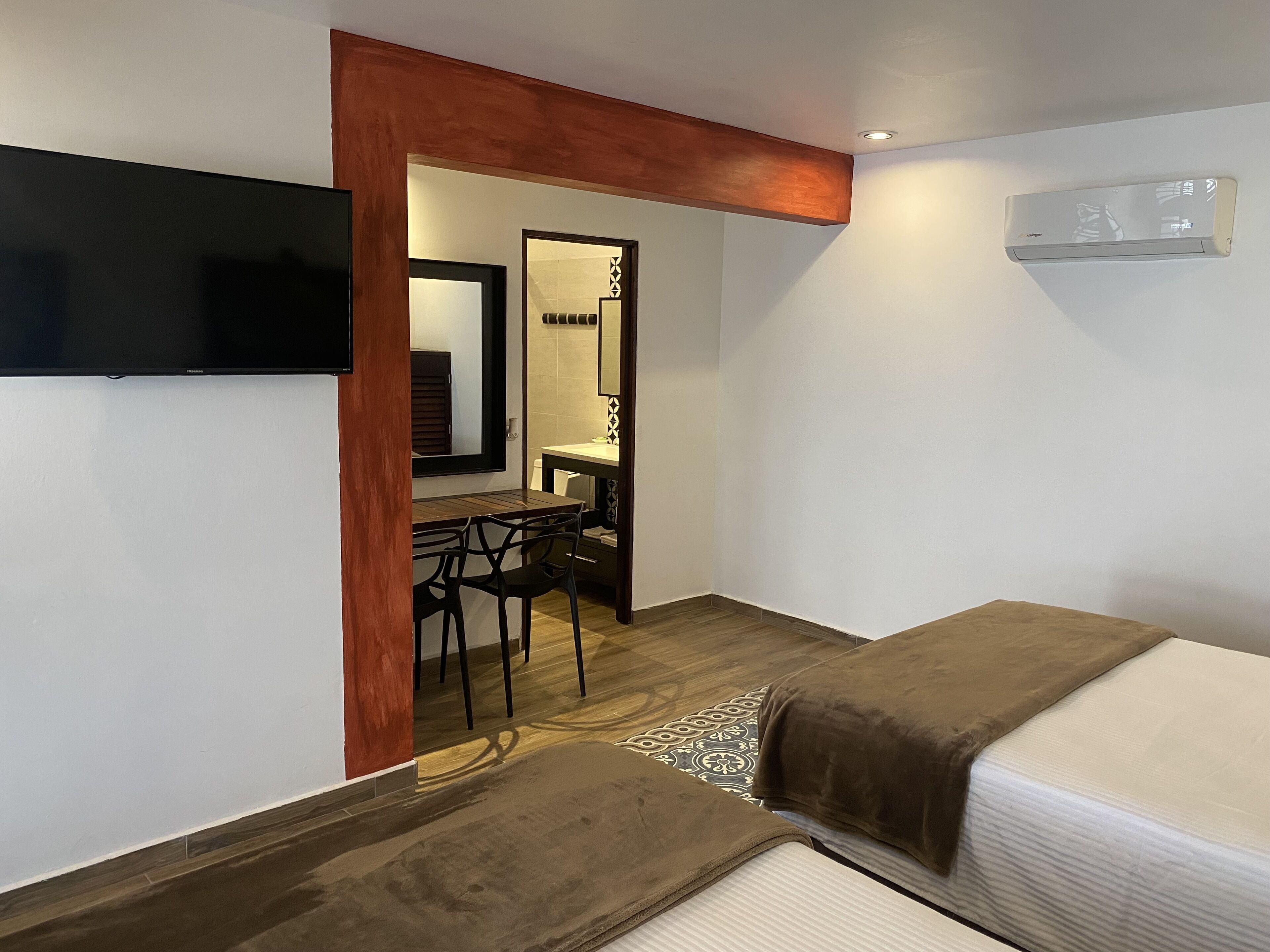 deluxe room, 2 double beds | iron/ironing board, free wifi, bed sheets