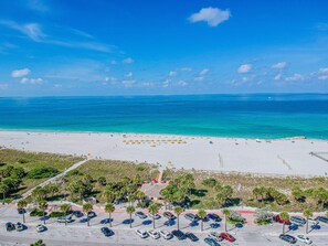 On the beach, sun loungers, beach towels