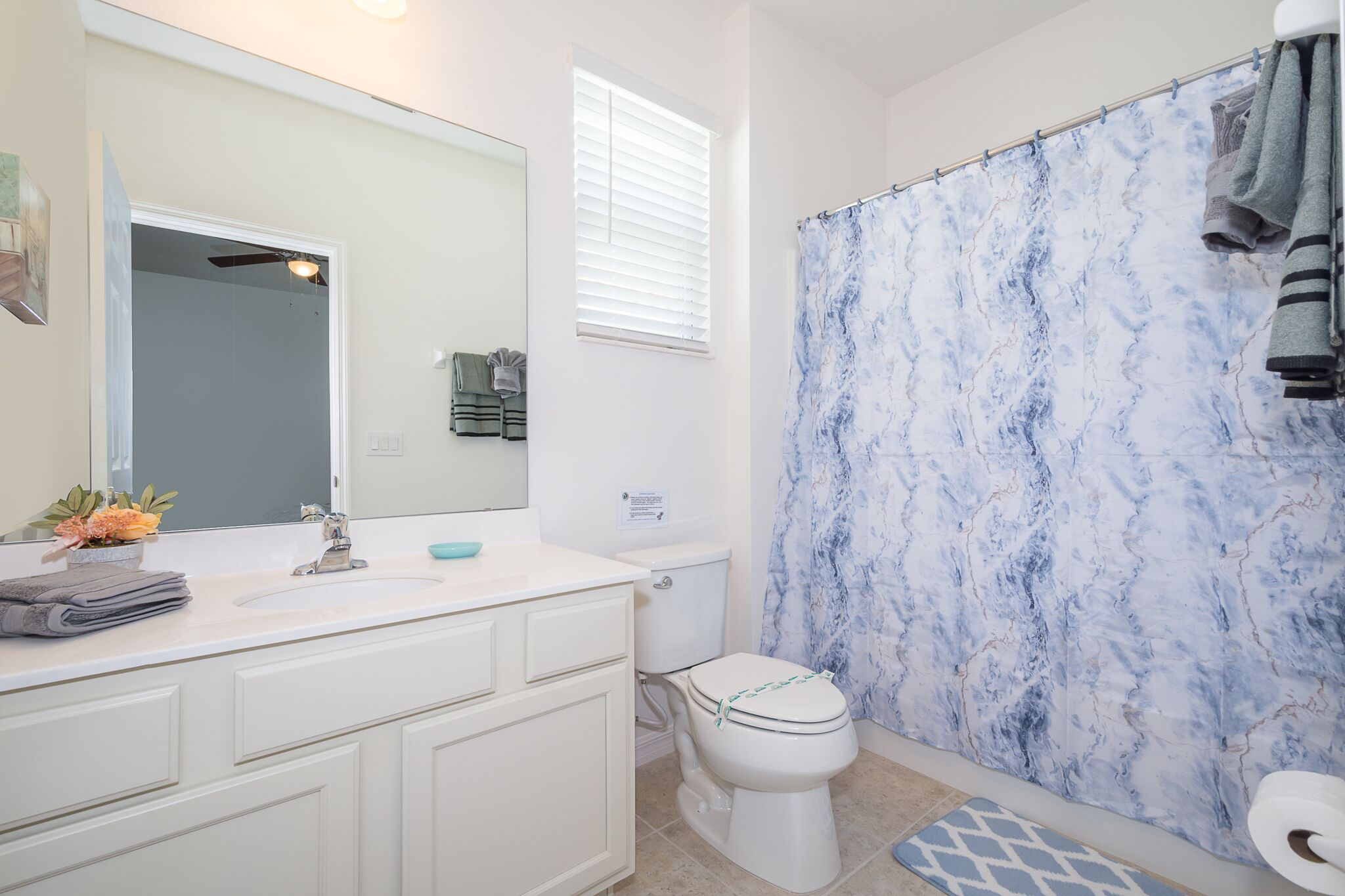 combined shower/bathtub, hair dryer, towels, soap