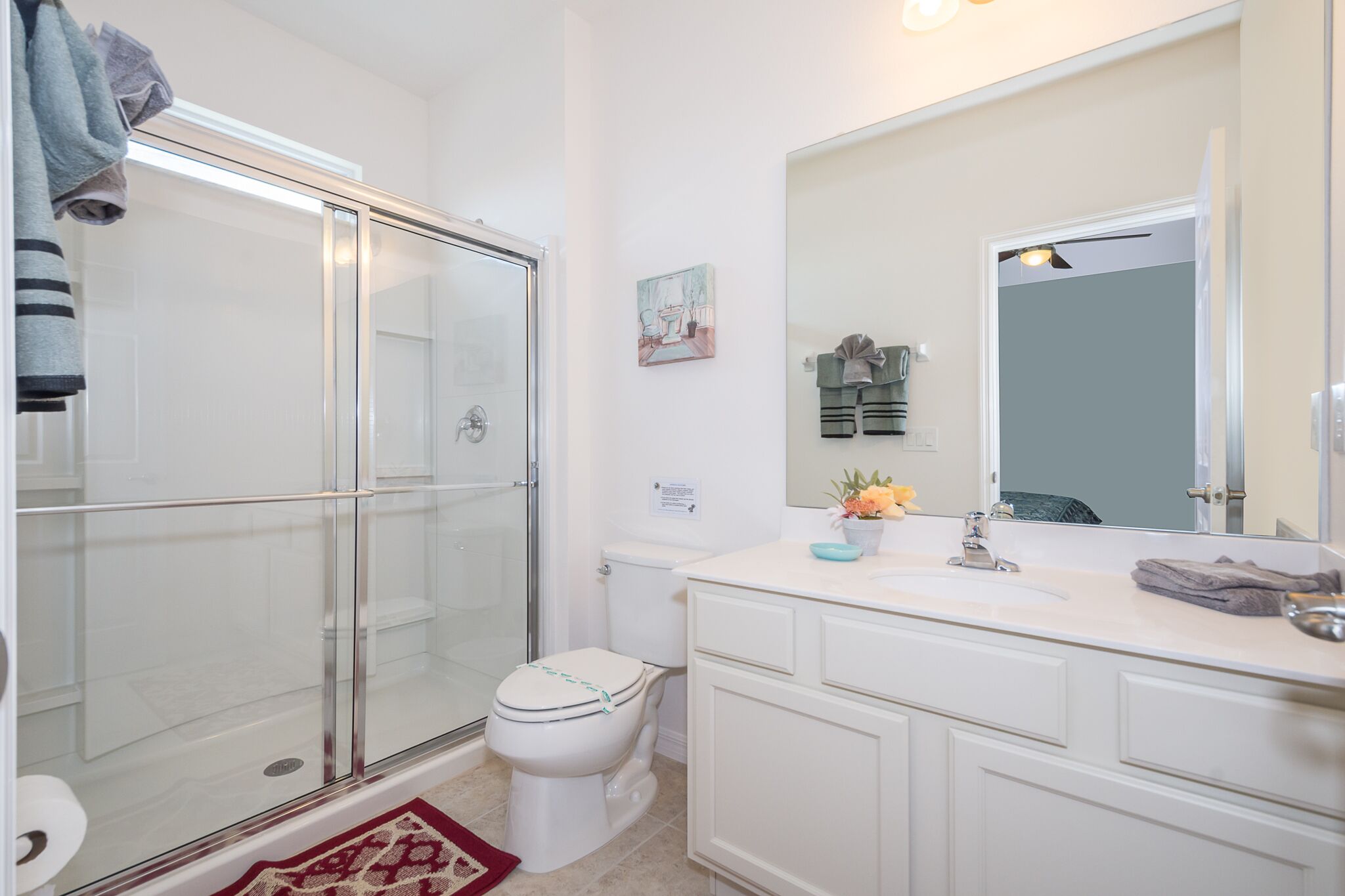 combined shower/bathtub, hair dryer, towels, soap