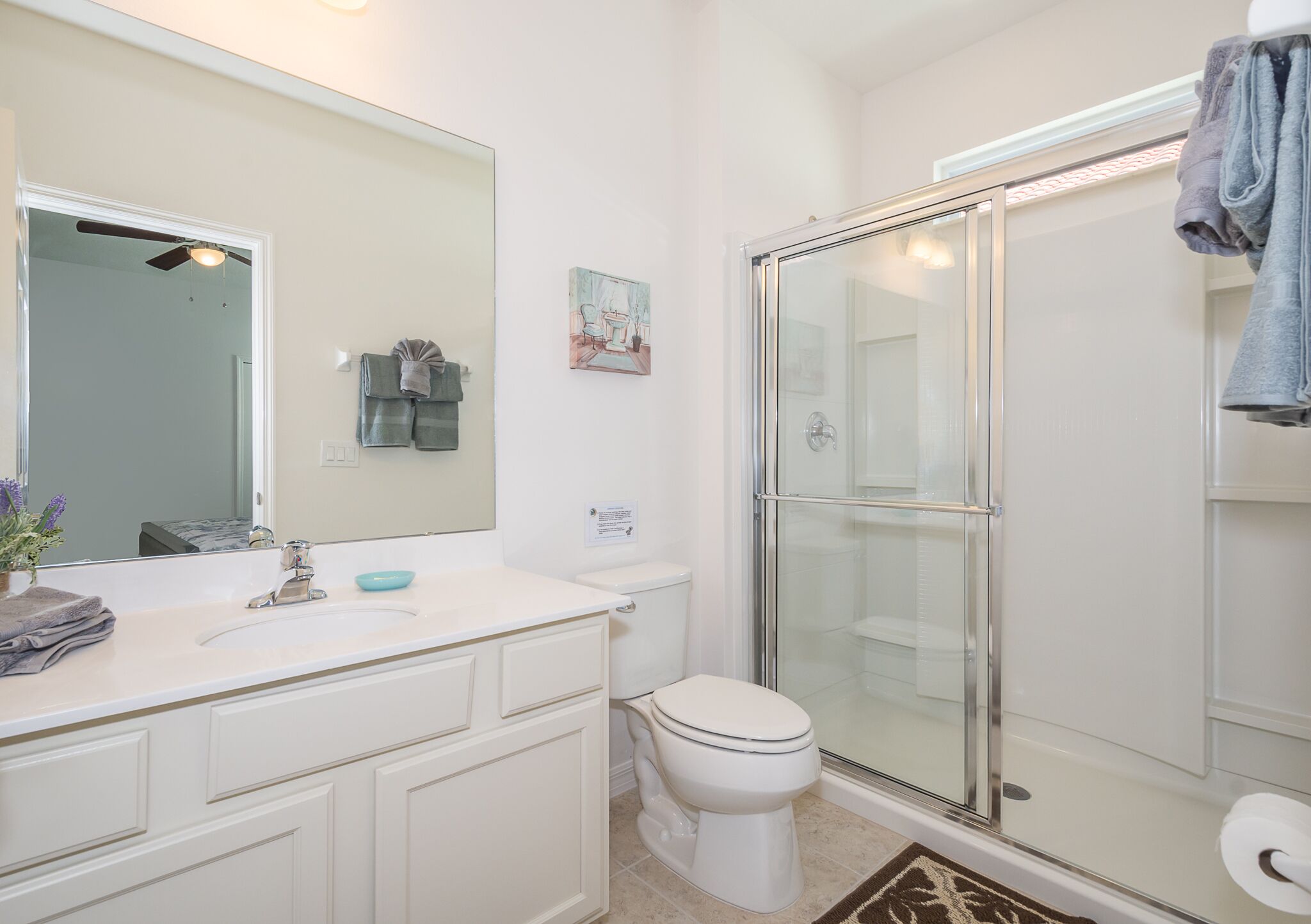 combined shower/bathtub, hair dryer, towels, soap