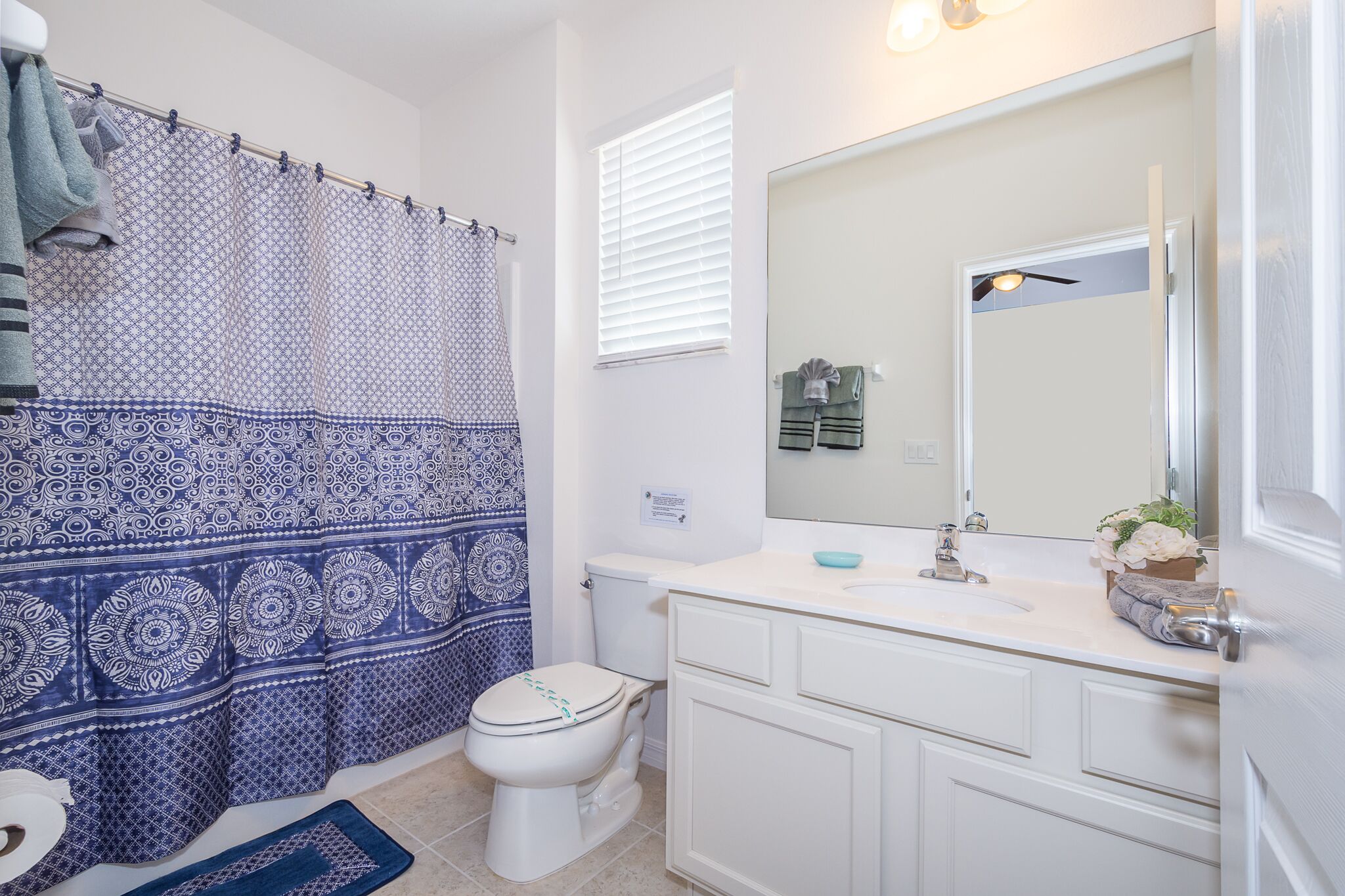 combined shower/bathtub, hair dryer, towels, soap