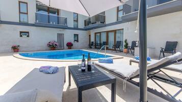 Outdoor pool, sun loungers