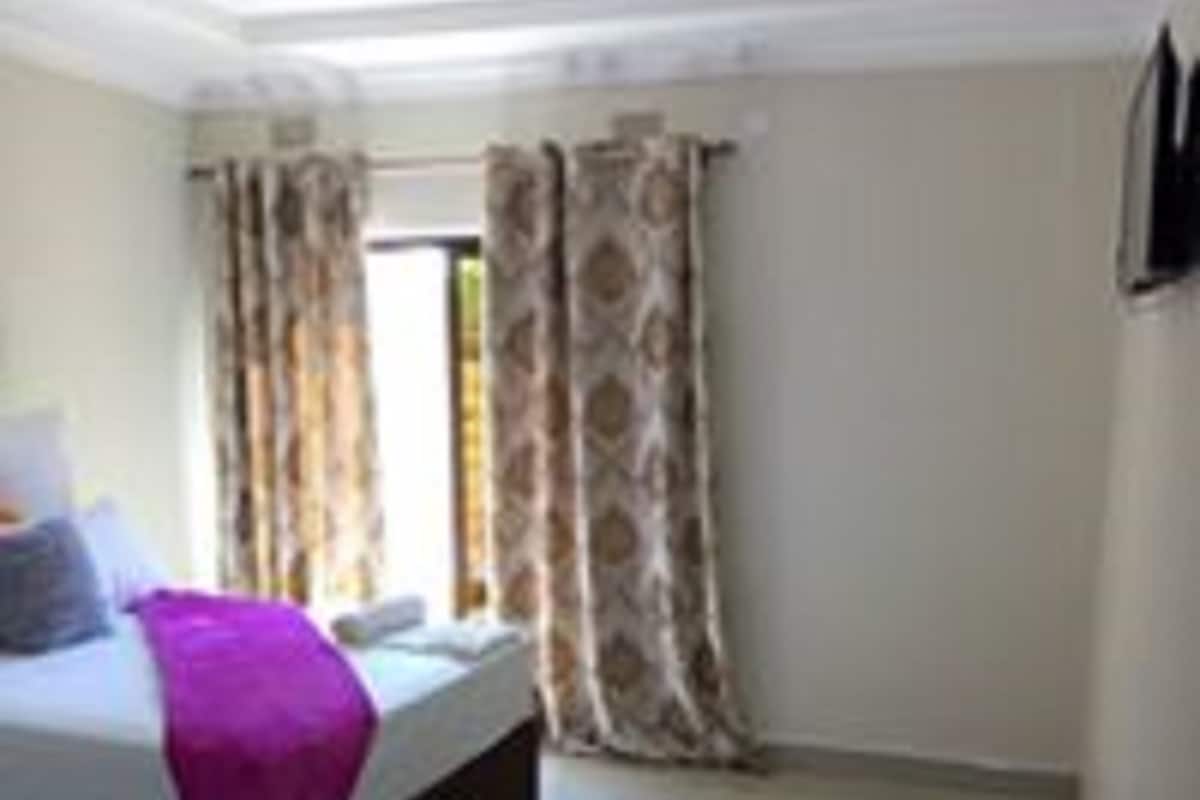Minibar, desk, laptop workspace, blackout curtains