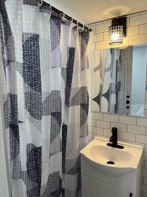 Hair dryer, towels, soap, toilet paper