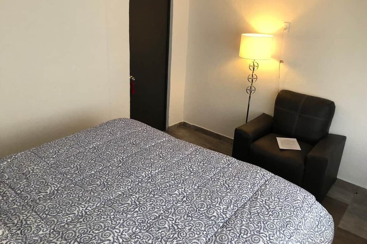 Habitación estándar, 1 cama matrimonial | Cortinas blackout, wifi gratis y ropa de cama