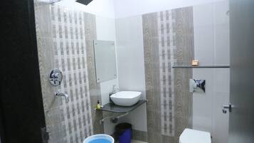 Shower, rainfall showerhead, towels