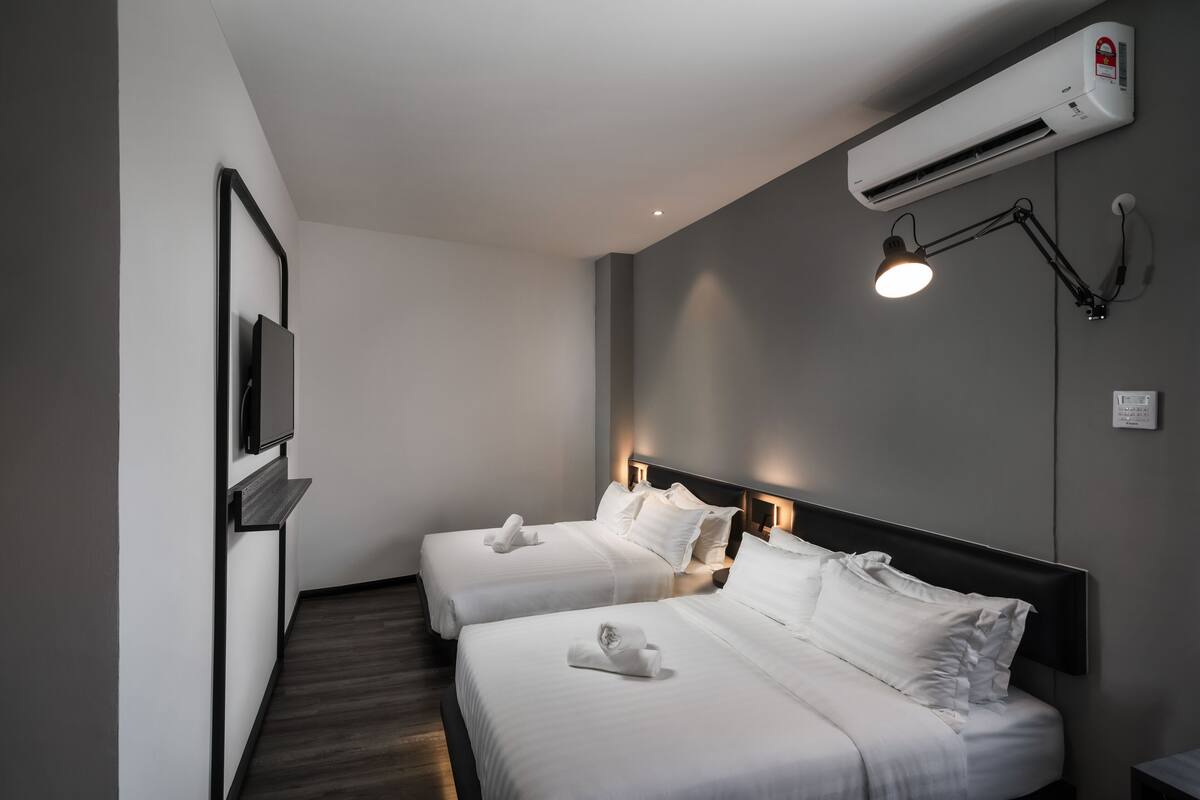 Family Quadruple Room | In-room safe, desk, blackout drapes, iron/ironing board