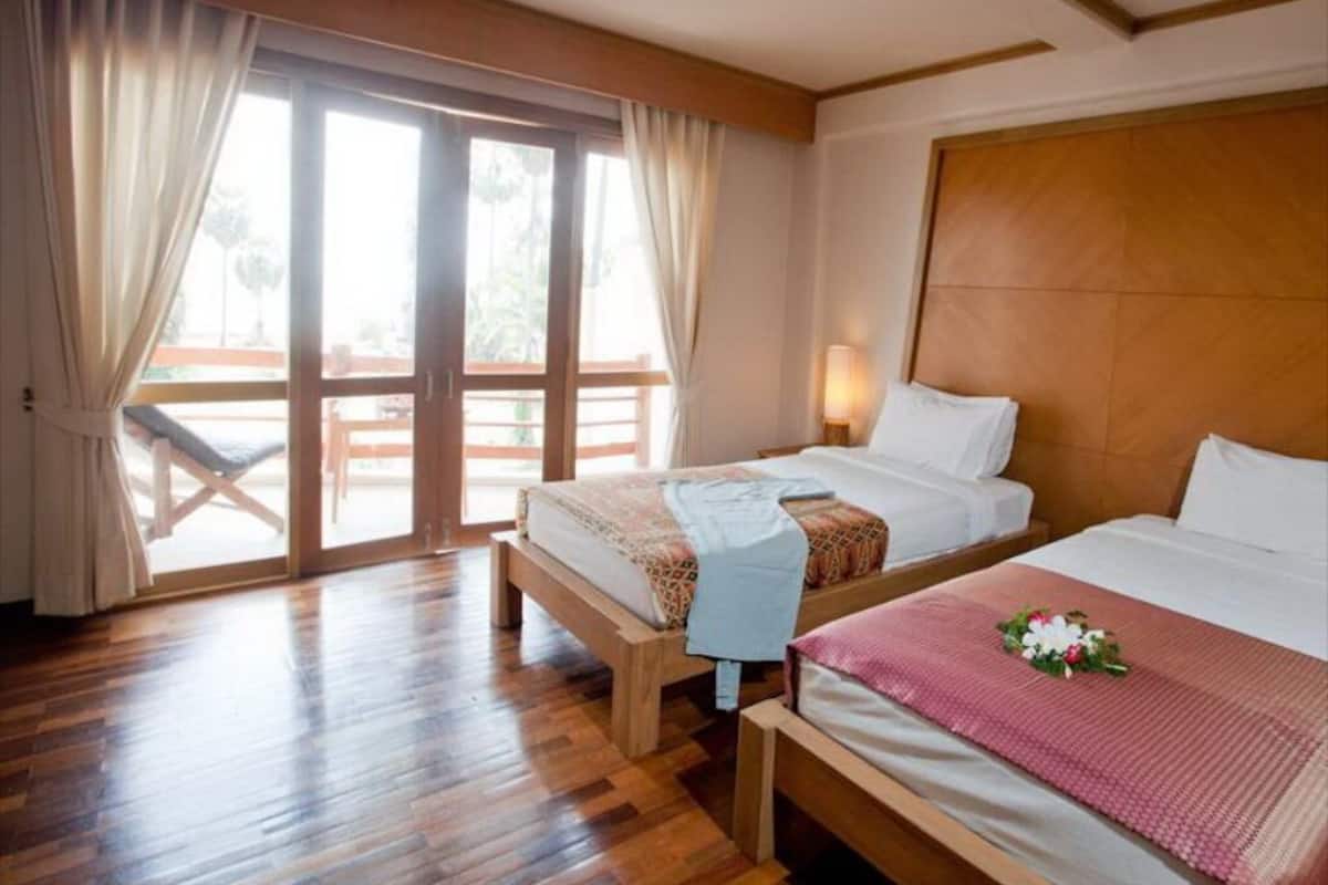 Chambre Confort avec lits jumeaux | Bureau, accès au Wi-Fi (inclus), décor unique, ameublement unique