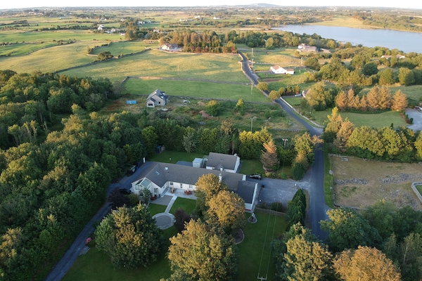 Kilbeg Pier and Lough Corrib from above — the lodge sits moments from the water