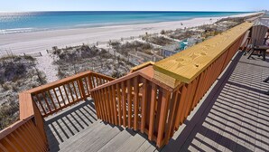 A wooden deck with a view of a beach and ocean. - Beautiful Beachfront 4BR Green Reef townhome with Ocean Views! (Destin)