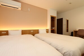 Habitación con 2 camas individuales (STAY2TwinRoom) | Edredón, escritorio, espacio para trabajar con laptop y wifi gratis 