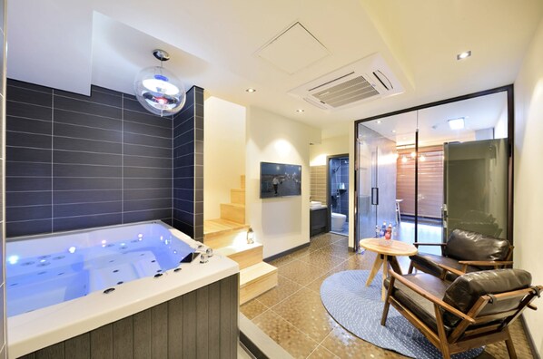 Spa Villa | Living area | 42-inch LED TV with cable channels, TV