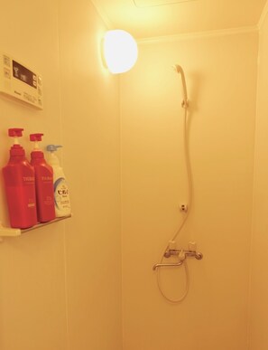 Apartment, 3 Bedrooms | Bathroom | Shower, free toiletries, hair dryer, slippers