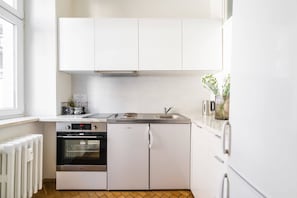 Loft Ville | Cuisine privée | Grand réfrigérateur, four, plaque de cuisson, cafetiÚre/bouilloire