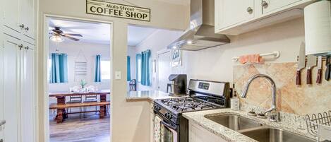 Fridge, microwave, stovetop, coffee/tea maker