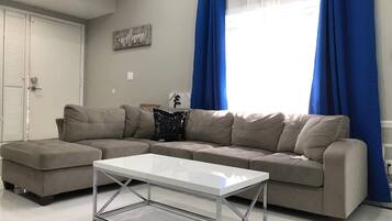 Ferienhaus (3 Bedrooms) | Wohnzimmer | Flachbildfernseher, Kamin, Netflix, Streaming-Dienste