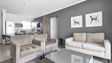 Apartment, 2 Bedrooms | Living room | Flat-screen TV