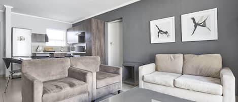 Apartment, 2 Bedrooms | Living room | Flat-screen TV