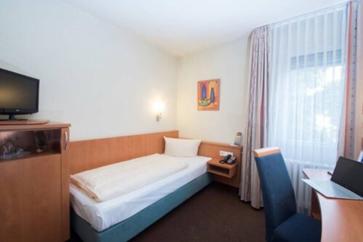 Einzelzimmer | Zimmersafe, kostenloses WLAN, Bettwäsche