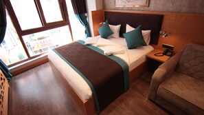 Chambre Triple Standard | Draps en coton égyptien, literie de qualité supérieure