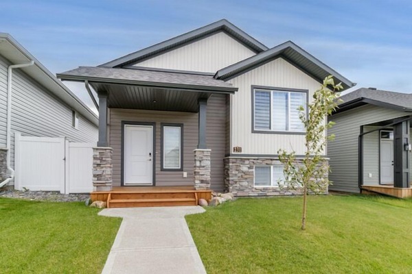 Front Entry is spacious. Stairs going up or down making it, a modified bilevel.