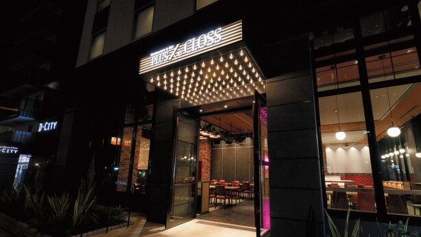 A restaurant with a modern exterior, featuring a prominent illuminated sign and a glass entrance. - DEL style Osaka Shin Umeda by Daiwa Roynet Hotel (Osaka)