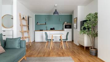 Suite L with sofa bed | Living area | Smart TV