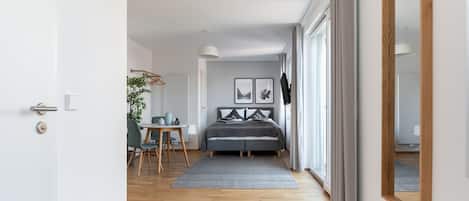 Suite, 1 cama Queen size (limehome Leipzig Jahnallee | Suite M ) | Área de sala de estar | Smart TV