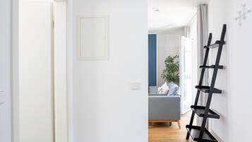 Suite L with balcony and sofa bed | Living area | Smart TV
