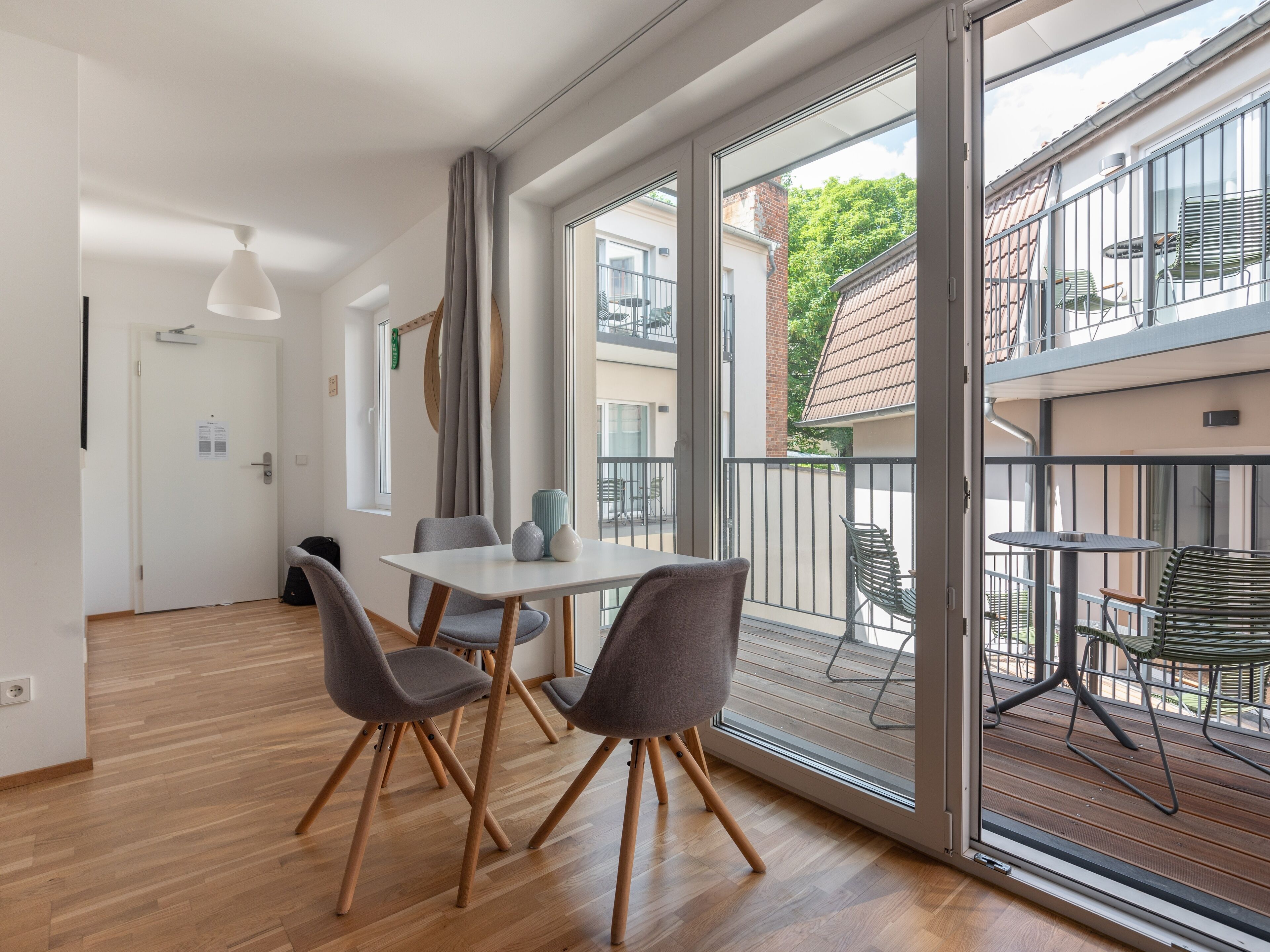 One-Bedroom suite with balcony | Living area | Smart TV