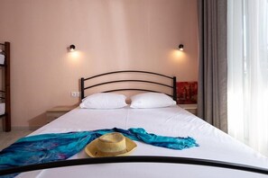 Suite estudio familiar, 1 habitación | Ropa de cama de alta calidad y caja de seguridad en la habitación