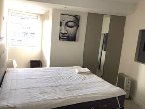 2 habitaciones, tabla de planchar con plancha, wifi y ropa de cama 