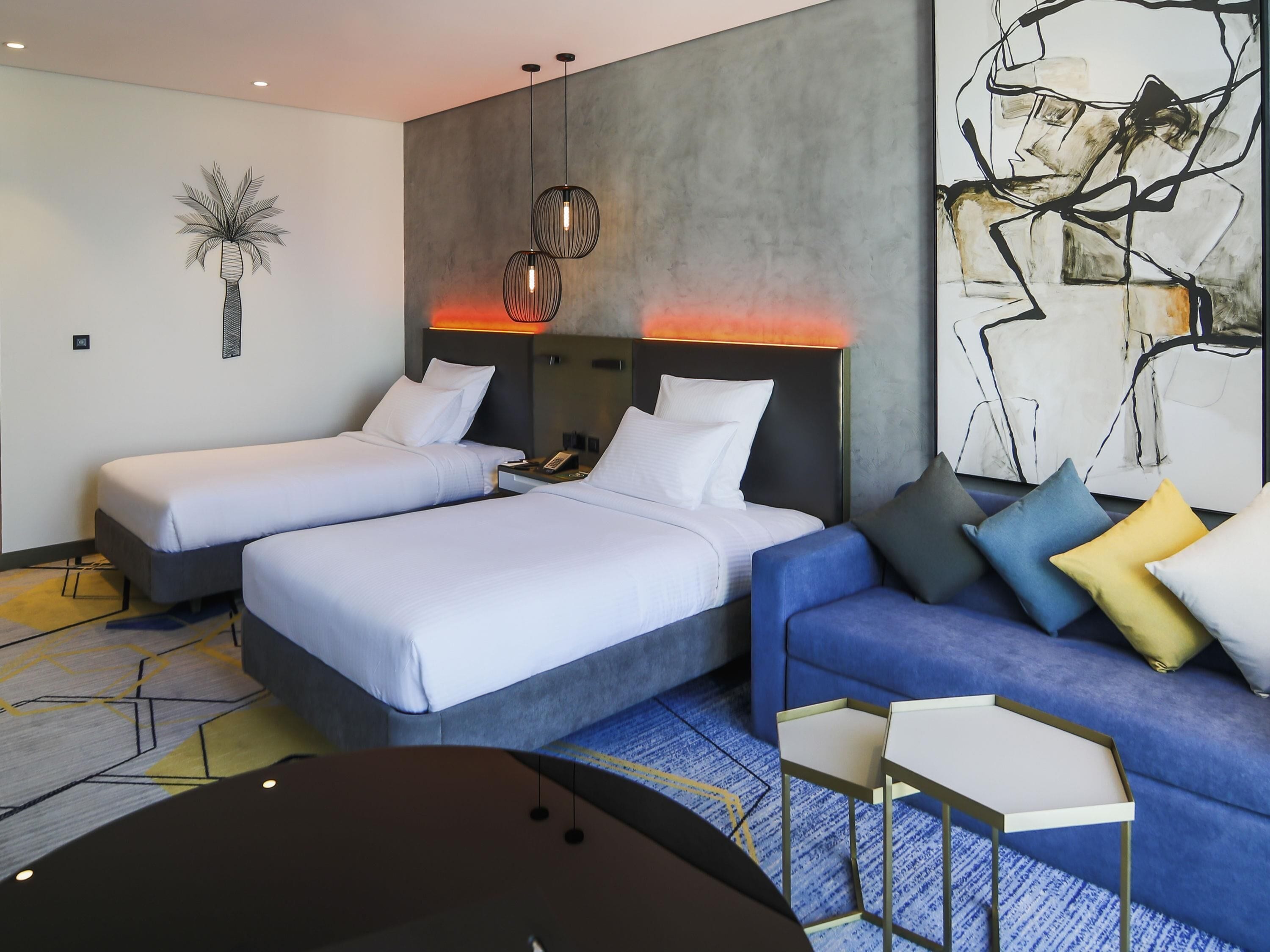 Deluxe Room, 2 Twin Beds, Lagoon View | Minibar, in-room safe, desk, laptop workspace