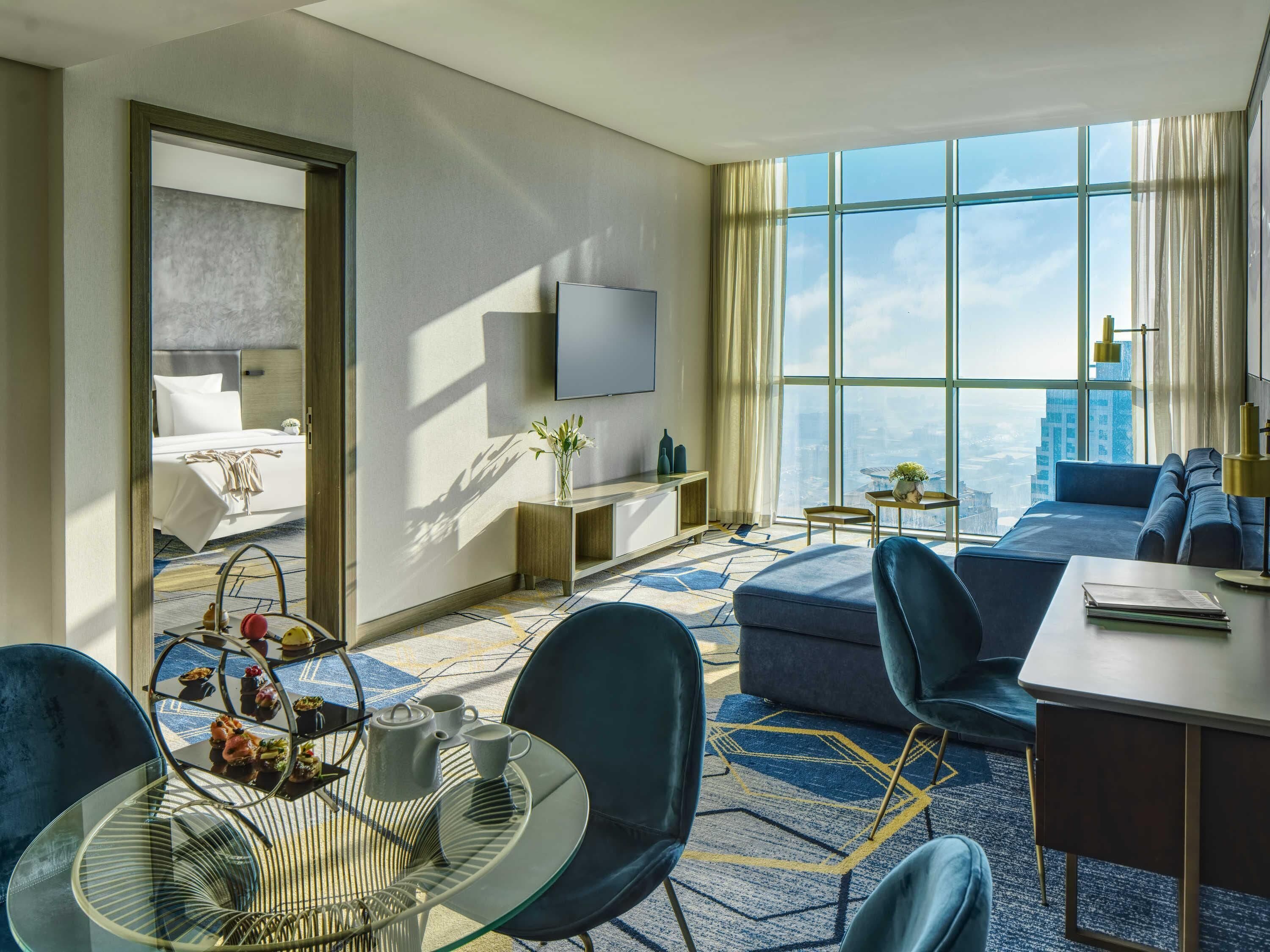 Deluxe Suite, 1 King Bed, Lagoon View | Minibar, in-room safe, desk, laptop workspace