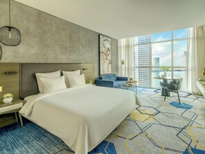 Deluxe Room, 1 King Bed, Lagoon View | Minibar, in-room safe, desk, laptop workspace