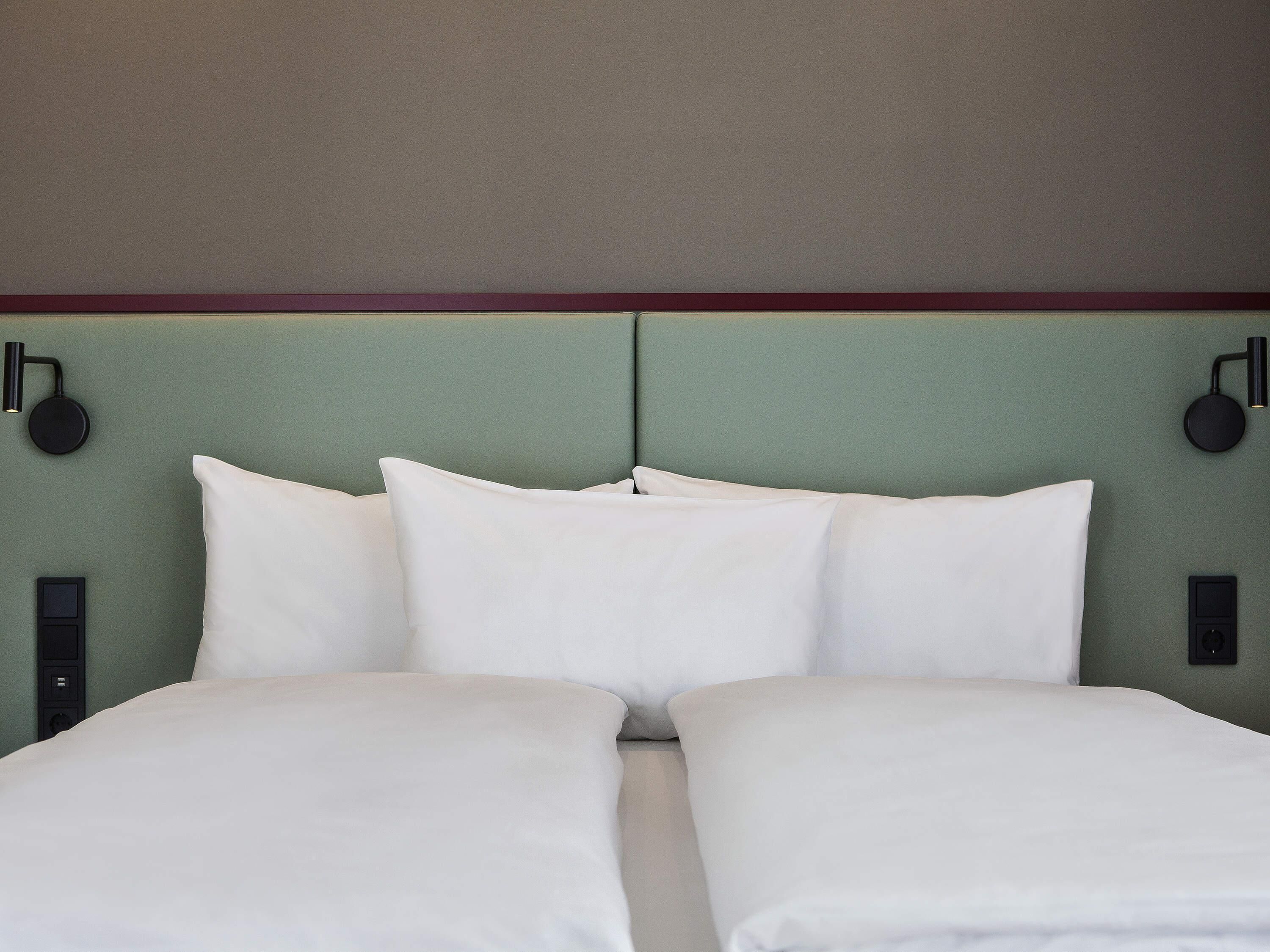 Desk, laptop workspace, blackout drapes, free cribs/infant beds