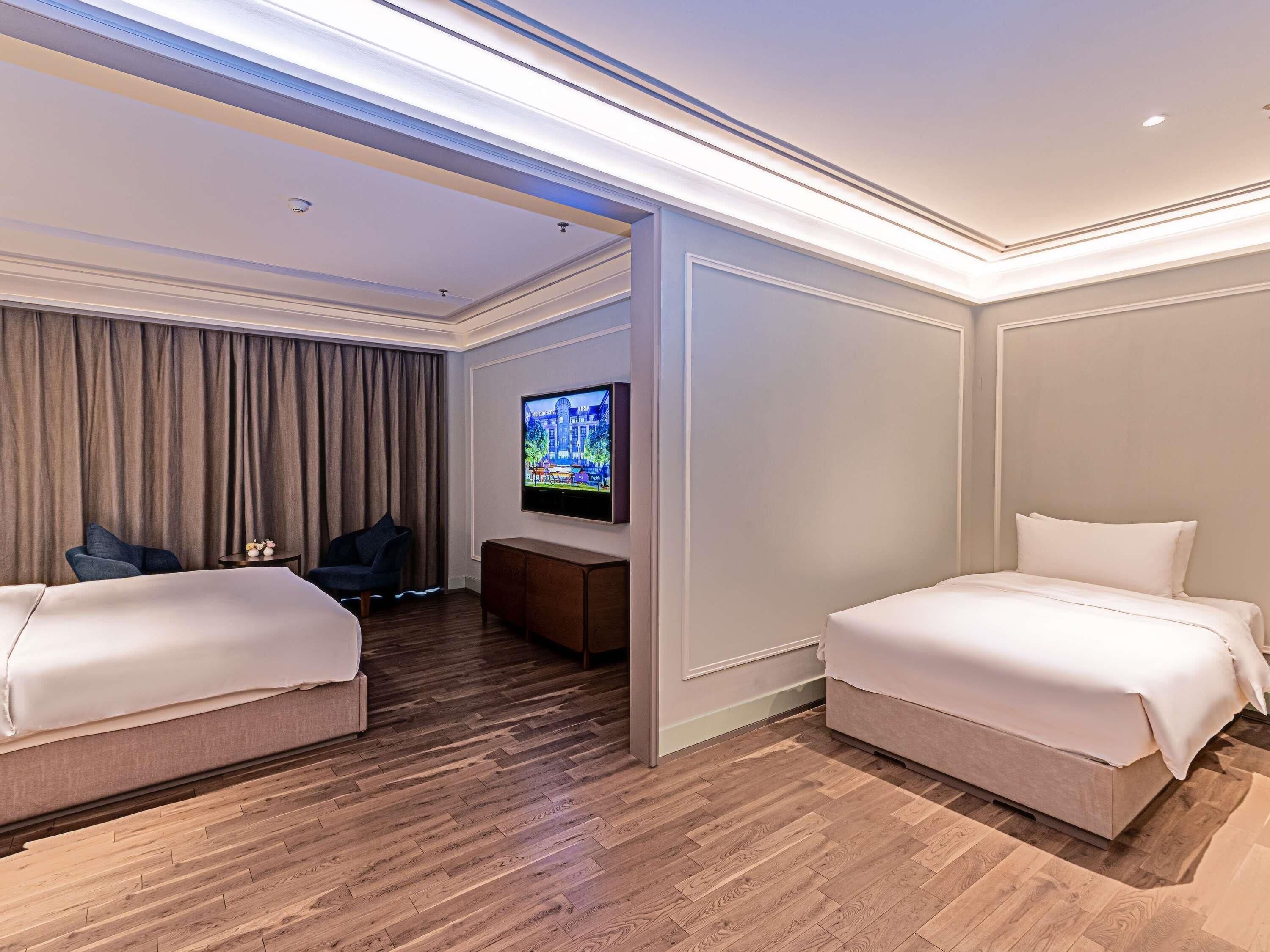 Suíte luxo, 1 cama King | Frigobar, Wi-Fi de cortesia