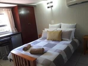 4 slaapkamers, een kluis op de kamer, een strijkplank/strijkijzer, wifi