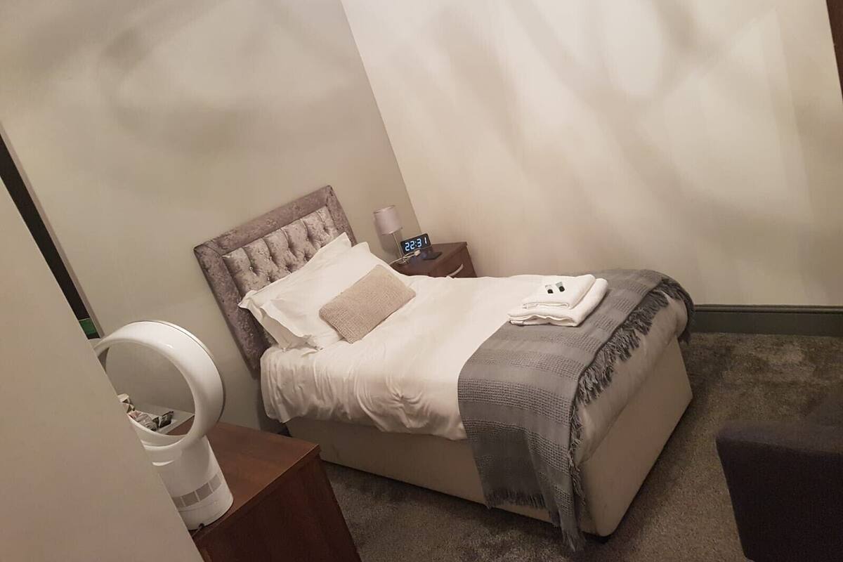Desk, iron/ironing board, cribs (free), WiFi (free)