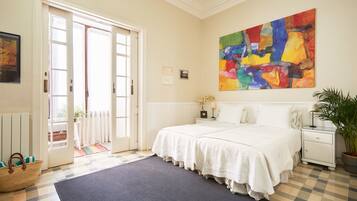Habitación con 2 camas individuales, vistas al jardín | Caja fuerte, wifi gratis, ropa de cama
