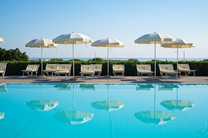 Seasonal outdoor pool, pool umbrellas, sun loungers